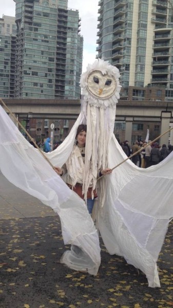 There were dancers dressed as giant snowy owls, and people dressed as bears, rainbow trout and salmon  in the throng. © Linda Nowlan 