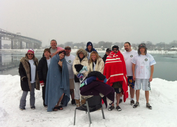 Polar Bear Dippers pose for a group shot, post-plunge!