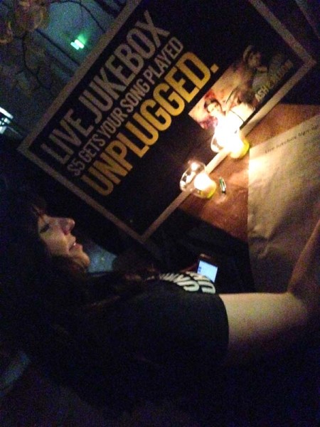 FCB Canada employee makes a request and donation at the Live Jukebox during Earth Hour © FCB Canada