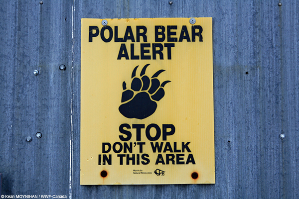 A sign warns people away from a polar bear holding area in near the Churchill Northern Studies Centre, Churchill, Manitoba, Canada 