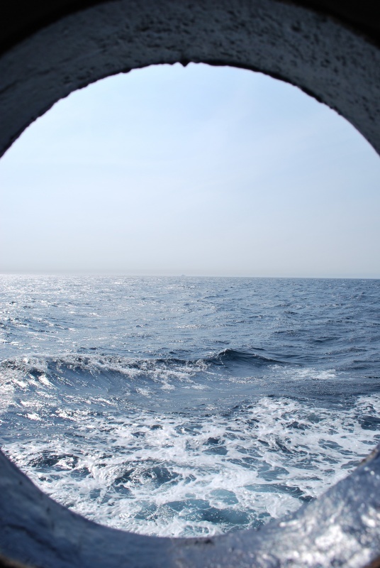 Porthole view of the waters of Hudson Strait, Canada
