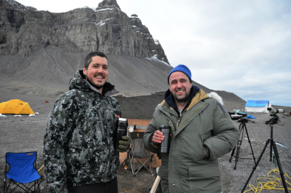 When I had the midnight shift, my teammates Joe (left) and Nigel would usually take over after me. (Yes, this is how light it was at midnight.) Warm beverages were a necessity for our three-hour shifts watching for narwhal. © Jacqueline Nunes / WWF-Canada