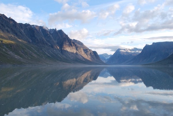 Caption: Mountains reflected in still water, Baffin Island, Nunavut, Canada. © Zoe Caron / WWF-Canada 