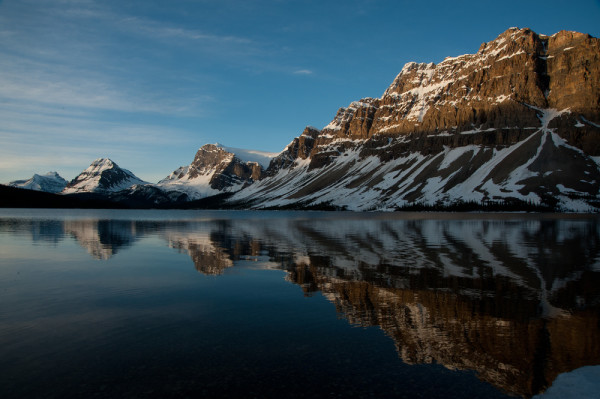 The Rocky Mountains reflected in Bow Lake in Banff National Park. © Niel W.