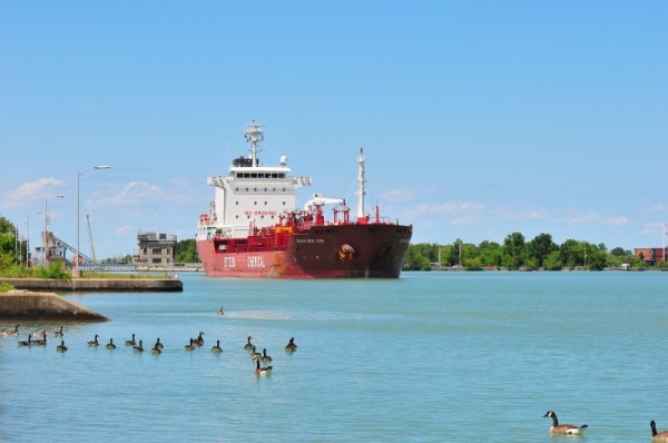 A ship on the Welland Canal near Saint Catharines, Ontario, Canada. The Welland Canal, part of the St. Lawrence Seaway, allows ships to detour Niagara Falls and pass from Lake Erie to Lake Ontario.