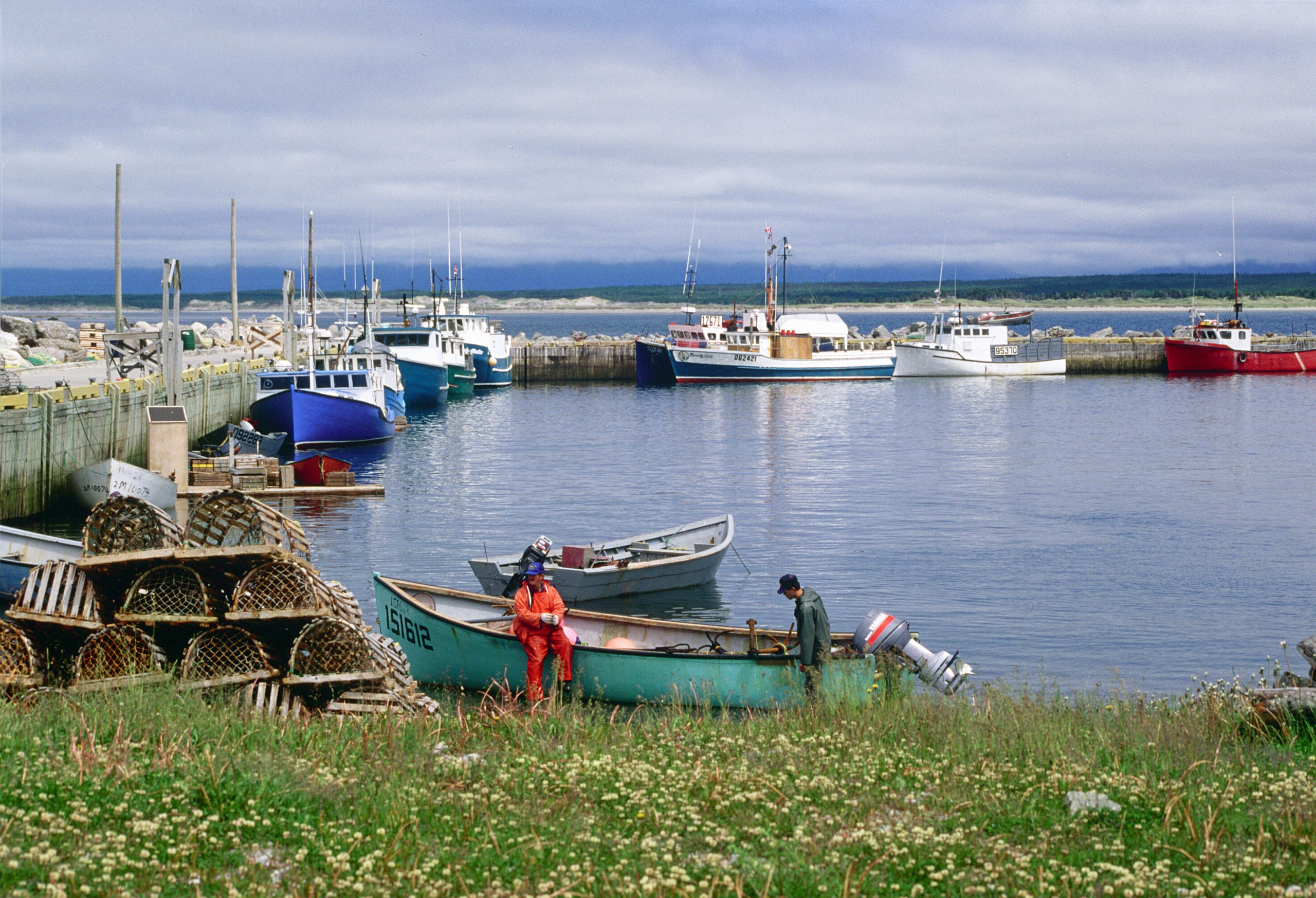 Fishing boats and fishermen, Newfoundland, Canada