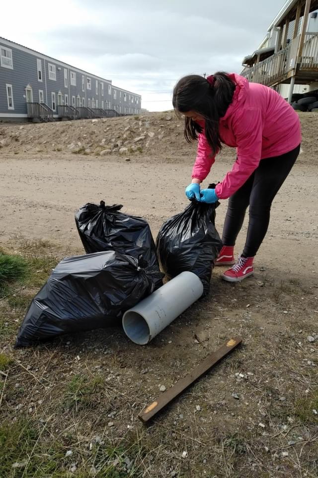 WWF-Canada intern Katie Yu doing a clean-up in Iqaluit, Nunavut