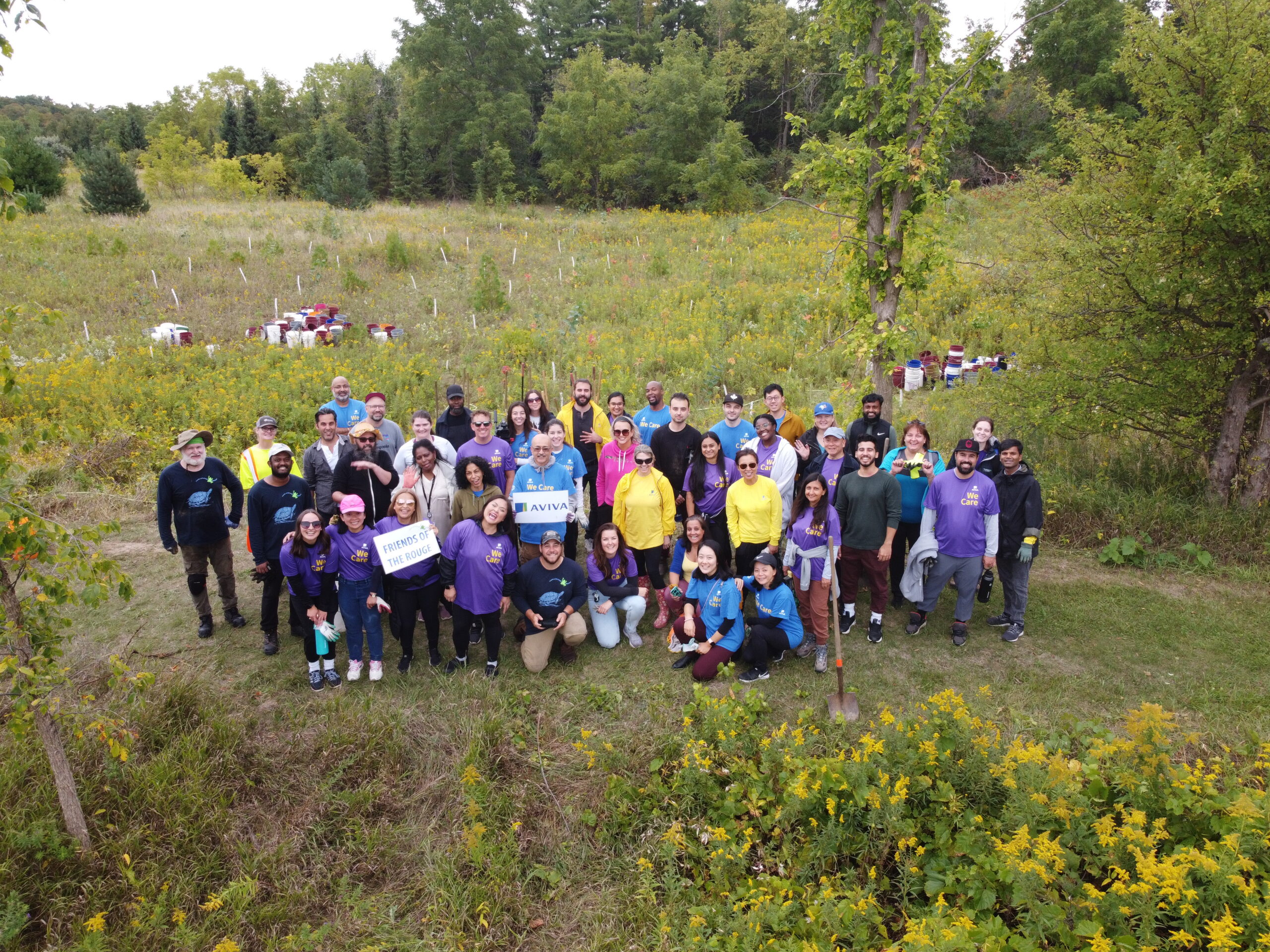 Aviva Canada team outside at a local restoration project. 