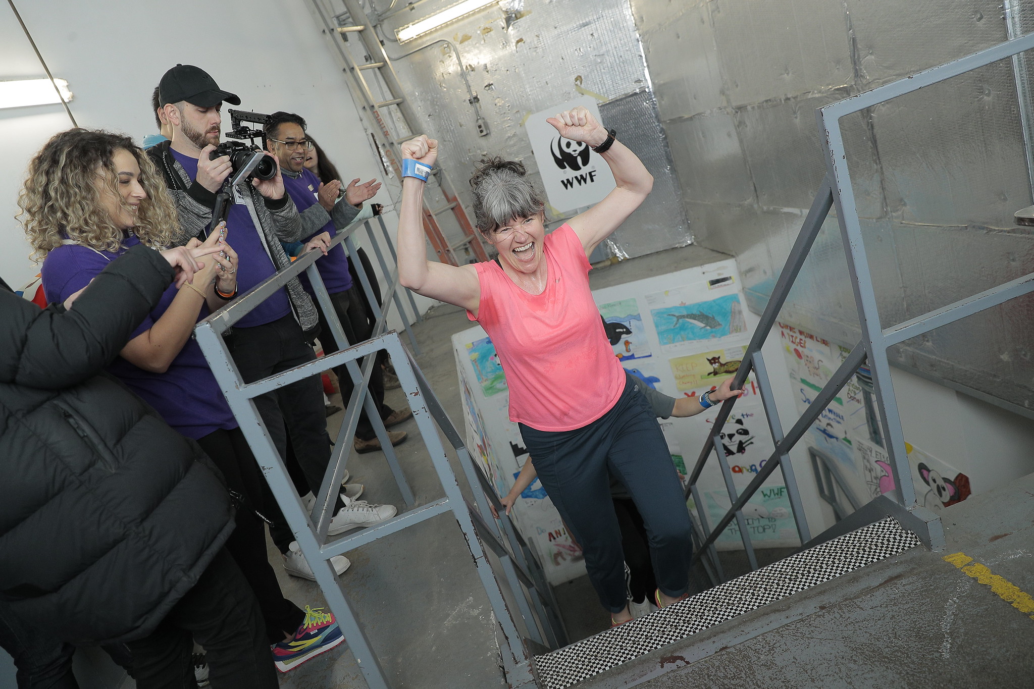 Woman in a pink shirt at the CN Tower Climb finish line