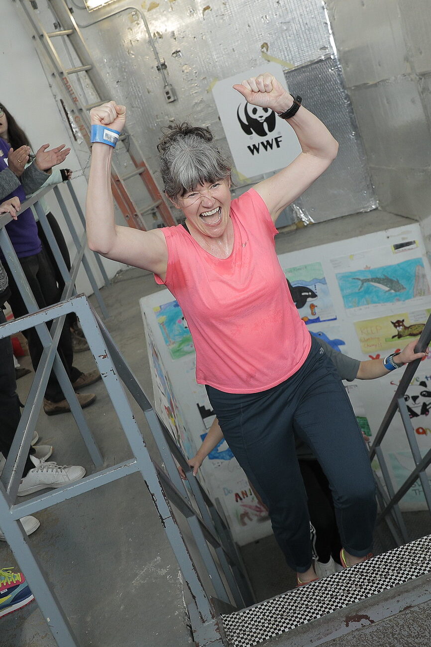 Woman in pink shirt at the CN Tower Climb finish line