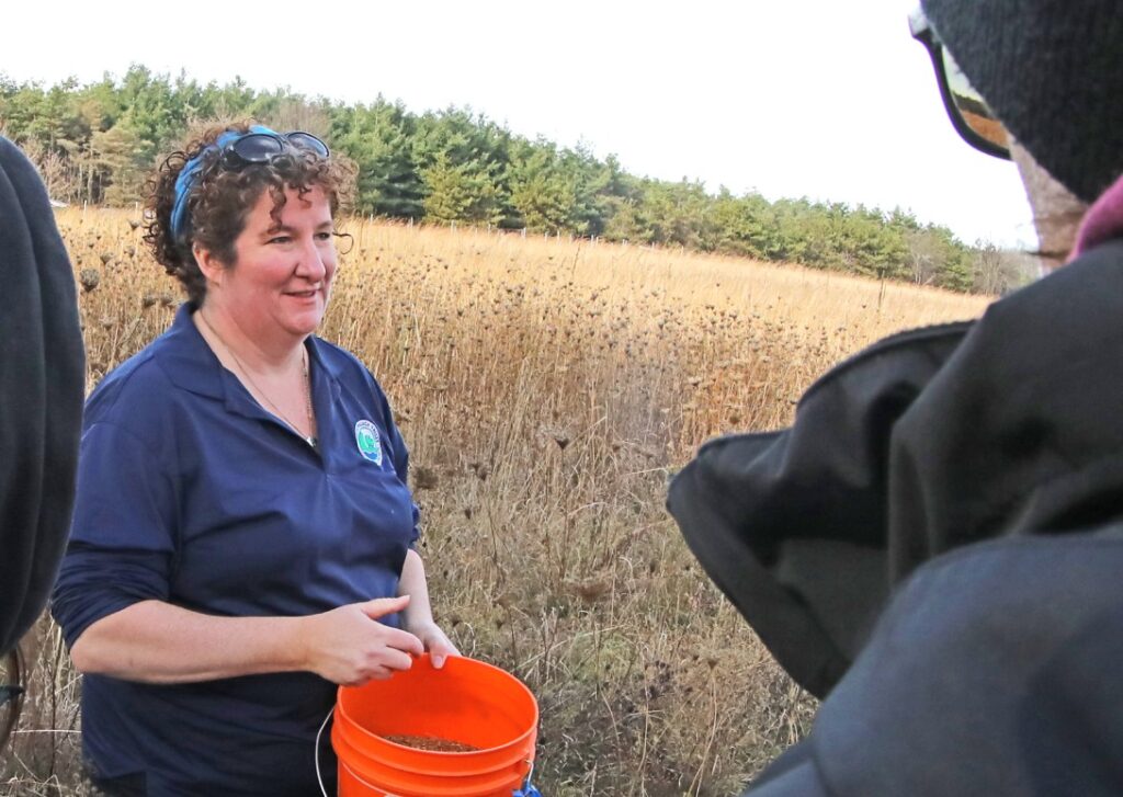 Shannon Stephens of the Nottawasaga Valley Conservation Authority in a grassland near Mono, Ont.