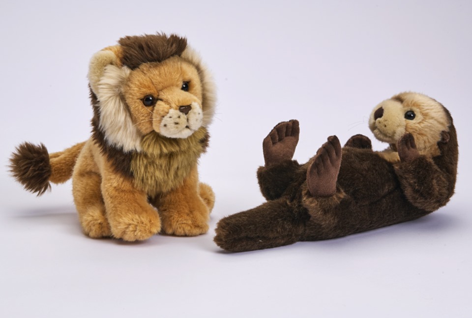 Lion and sea otter plush